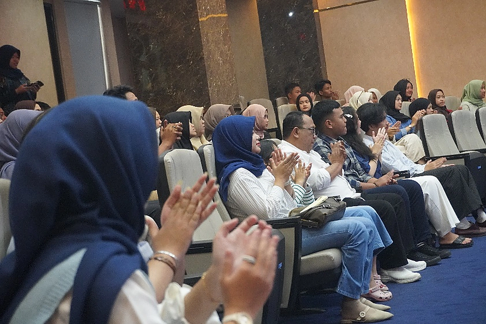 Audience appreciation during the Aksatadharma Production Film Festival